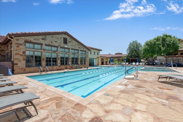 205 Versilia Cir, Lakeway, TX 78734 - community pool with a patio area
