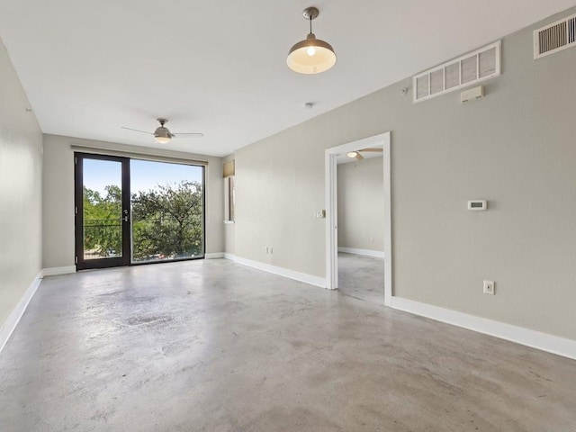3016 Guadalupe St Unit 211, Austin, TX 78705 - unfurnished room featuring a ceiling fan and concrete floors