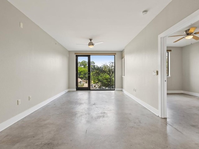 3016 Guadalupe St Unit 211, Austin, TX 78705 - spare room with finished concrete flooring, ceiling fan, and a smoke detector