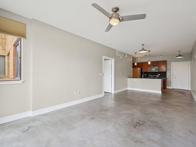3016 Guadalupe St Unit 211, Austin, TX 78705 - unfurnished living room featuring finished concrete floors, ceiling fan, and track lighting