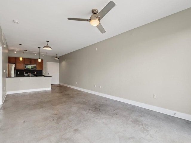 3016 Guadalupe St Unit 211, Austin, TX 78705 - unfurnished living room featuring concrete flooring and ceiling fan