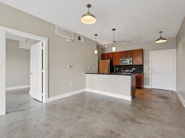 3016 Guadalupe St Unit 211, Austin, TX 78705 - kitchen with stainless steel microwave, freestanding refrigerator, concrete floors, and dark countertops