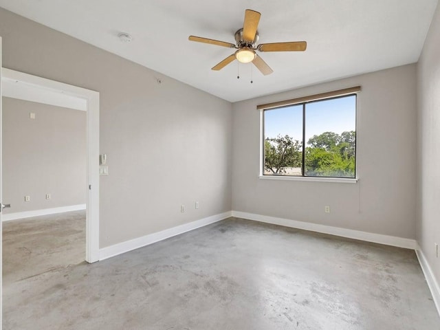 3016 Guadalupe St Unit 211, Austin, TX 78705 - empty room with unfinished concrete floors, a smoke detector, and a ceiling fan