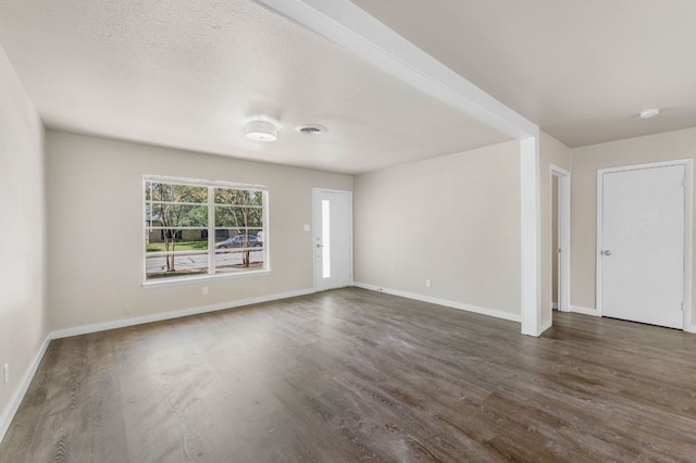 5302 Robinsdale Ln, Austin, TX 78723 - spare room featuring dark wood finished floors and a smoke detector