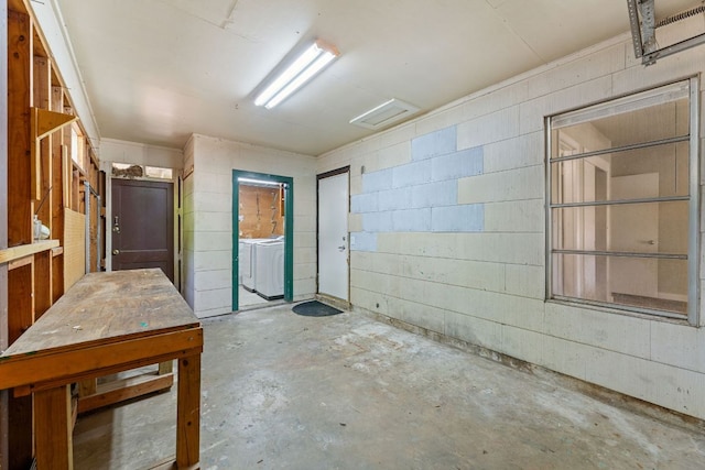 5302 Robinsdale Ln, Austin, TX 78723 - below grade area featuring concrete block wall and washer / dryer