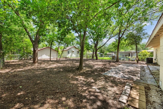 5302 Robinsdale Ln, Austin, TX 78723 - fenced backyard with a patio