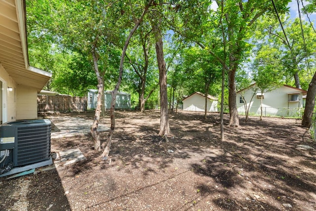 5302 Robinsdale Ln, Austin, TX 78723 - view of yard with a storage unit