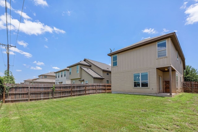 16216 Travesia Way, Austin, TX 78728 - rear view of house with a fenced backyard