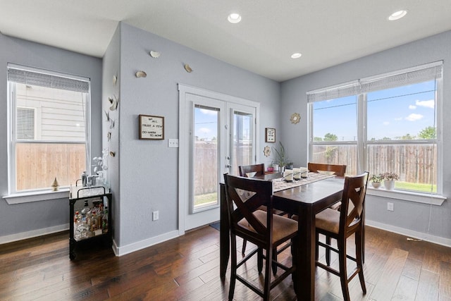 16216 Travesia Way, Austin, TX 78728 - dining room with healthy amount of natural light, french doors, dark wood-style floors, and recessed lighting