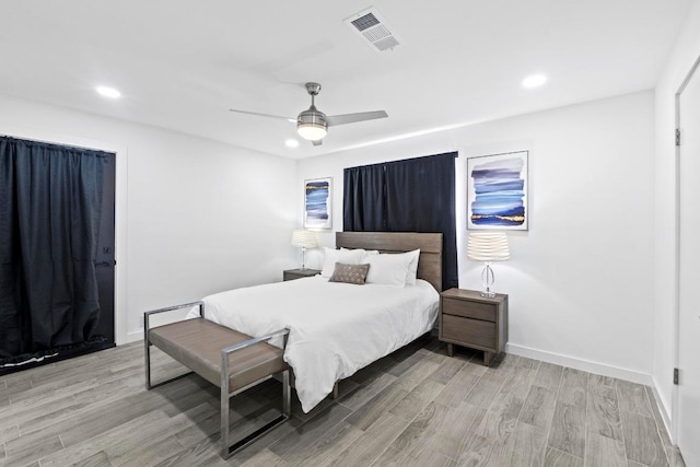 3520 Highland View Dr, Austin, TX 78731 - bedroom with light wood-style flooring, recessed lighting, and a ceiling fan