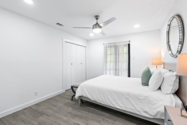 3520 Highland View Dr, Austin, TX 78731 - bedroom with recessed lighting, wood finished floors, ceiling fan, and a closet