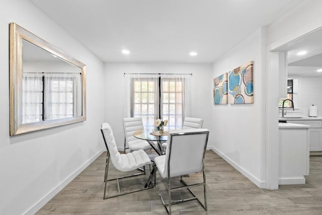 3520 Highland View Dr, Austin, TX 78731 - dining space featuring recessed lighting and light wood finished floors
