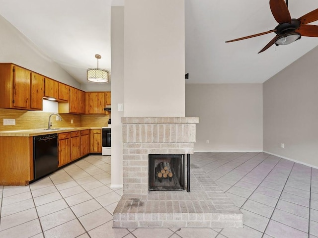 11608 Norwegian Wood Dr, Austin, TX 78758 - kitchen featuring dishwasher, lofted ceiling, light tile patterned floors, tasteful backsplash, and ceiling fan
