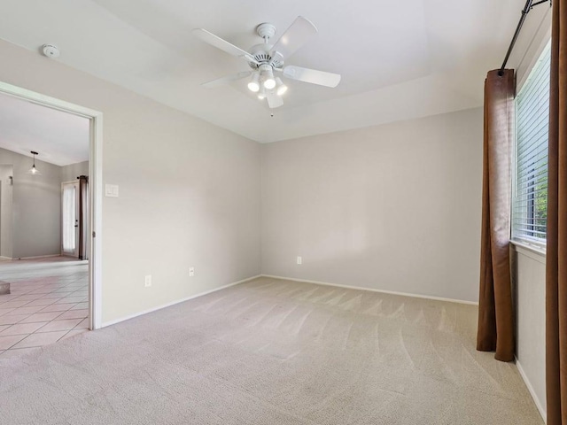 11608 Norwegian Wood Dr, Austin, TX 78758 - unfurnished room with a smoke detector, light carpet, and a ceiling fan