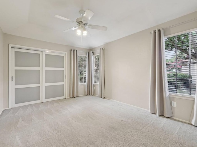 11608 Norwegian Wood Dr, Austin, TX 78758 - unfurnished bedroom with carpet floors and multiple windows
