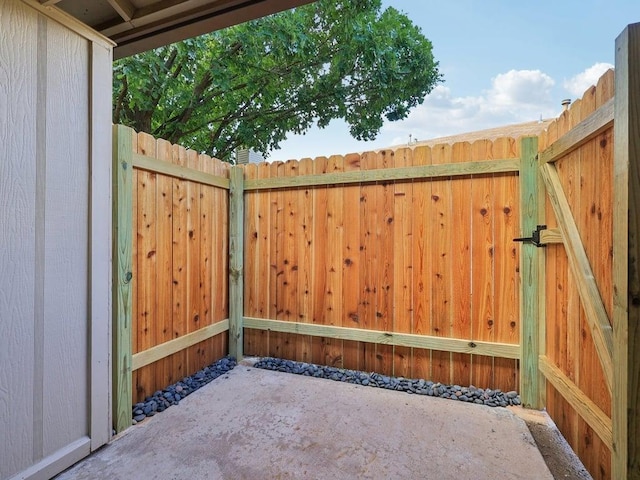 11608 Norwegian Wood Dr, Austin, TX 78758 - gate featuring a patio area