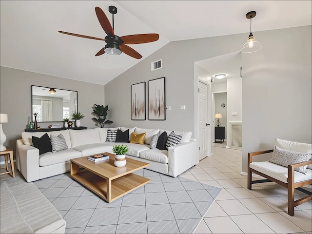 11608 Norwegian Wood Dr, Austin, TX 78758 - living room featuring a ceiling fan, vaulted ceiling, and light tile patterned floors