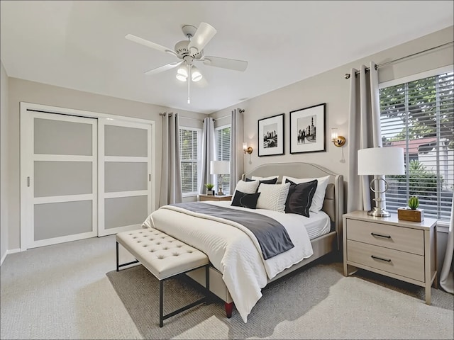11608 Norwegian Wood Dr, Austin, TX 78758 - bedroom with light colored carpet and ceiling fan
