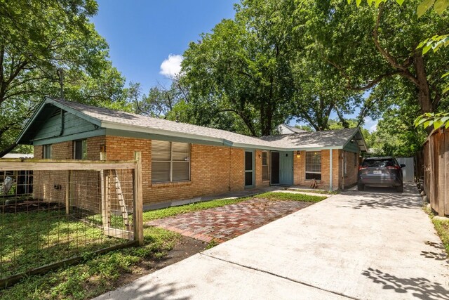 4108 Lewis Ln Unit A & B, Austin, TX 78756 - ranch-style home with driveway and brick siding
