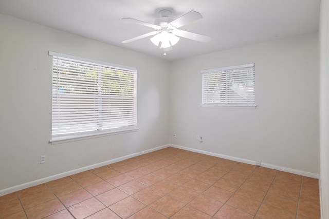 4108 Lewis Ln Unit A & B, Austin, TX 78756 - unfurnished room featuring healthy amount of natural light, ceiling fan, and light tile patterned floors