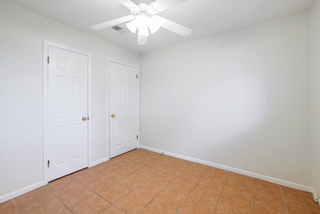 4108 Lewis Ln Unit A & B, Austin, TX 78756 - unfurnished bedroom featuring light tile patterned flooring and ceiling fan