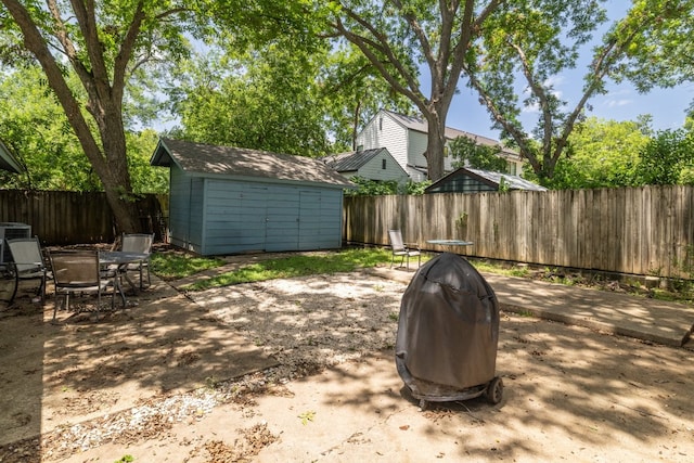 4108 Lewis Ln Unit A & B, Austin, TX 78756 - fenced backyard with a storage unit and a patio