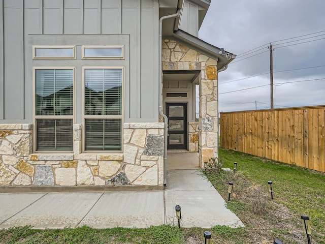 2800 Sebring Cir, Austin, TX 78747 - entrance to property with stone siding and board and batten siding
