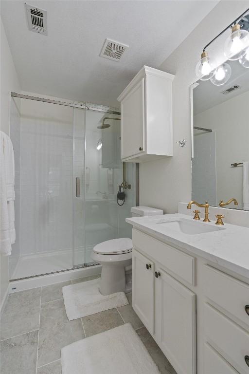 208 Meadowside Dr, Hutto, TX 78634 - bathroom with vanity and a shower stall