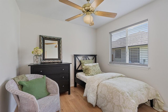 208 Meadowside Dr, Hutto, TX 78634 - bedroom with light wood-style flooring and ceiling fan