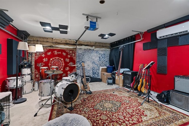 208 Meadowside Dr, Hutto, TX 78634 - recreation room with a wall unit AC, a garage, and carpet floors