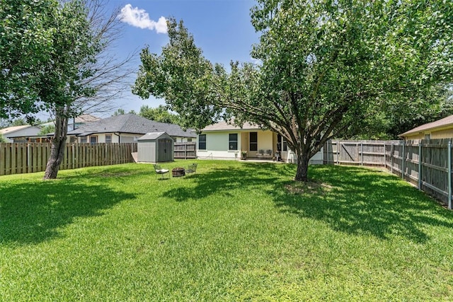 208 Meadowside Dr, Hutto, TX 78634 - fenced backyard with a storage shed and a patio area