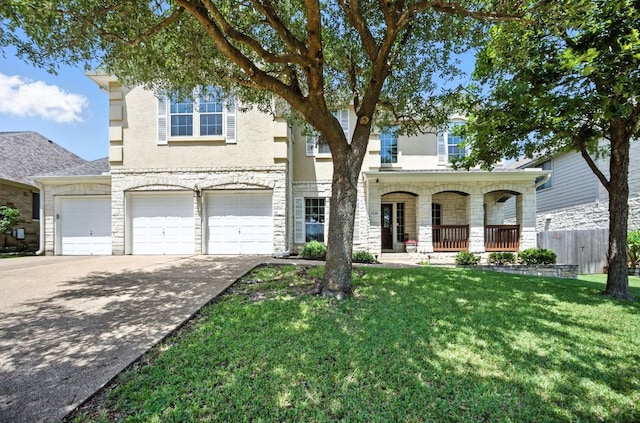 1208 Pine Forest Cir, Round Rock, TX 78665 - traditional-style home with concrete driveway, stone siding, covered porch, a garage, and stucco siding
