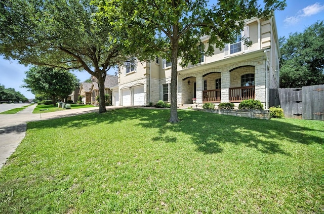1208 Pine Forest Cir, Round Rock, TX 78665 - view of front of property featuring a garage, concrete driveway, stone siding, and a porch