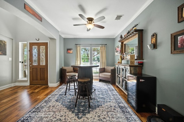 1208 Pine Forest Cir, Round Rock, TX 78665 - dining room featuring wood finished floors, ceiling fan, and crown molding