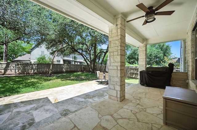 1208 Pine Forest Cir, Round Rock, TX 78665 - fenced backyard with ceiling fan, a patio area, and area for grilling
