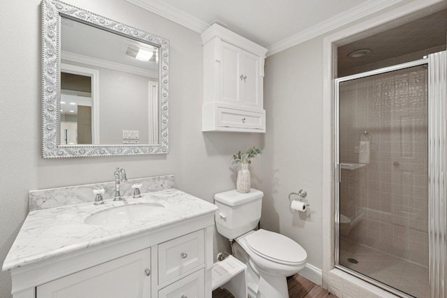 7204 Guava Cv, Austin, TX 78750 - full bath with vanity, a shower stall, crown molding, and wood finished floors