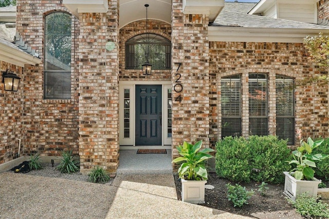 7204 Guava Cv, Austin, TX 78750 - view of exterior entry featuring brick siding