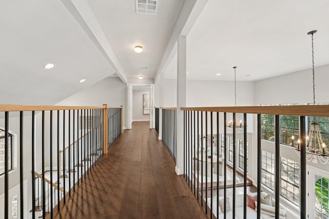 7204 Guava Cv, Austin, TX 78750 - corridor with a chandelier, wood finished floors, and recessed lighting