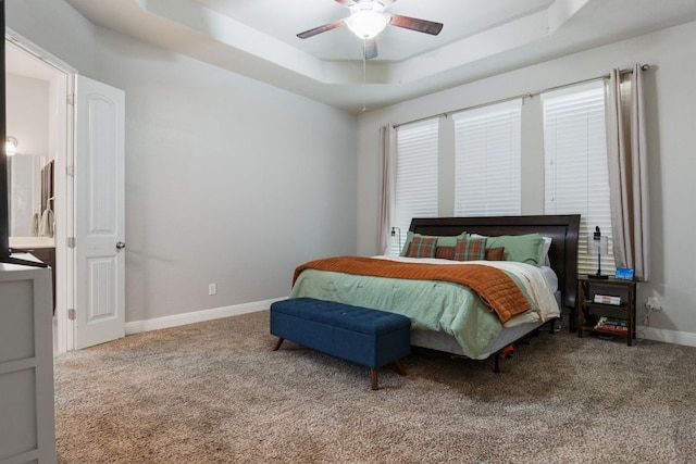 30872 Schlather Ln, Bulverde, TX 78163 - bedroom with carpet floors, a tray ceiling, and ceiling fan