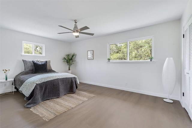 10133 Oliver Dr, Austin, TX 78737 - bedroom with wood finished floors and ceiling fan