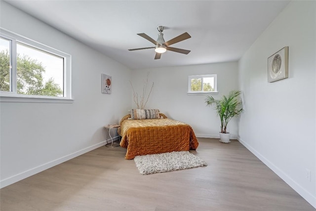 10133 Oliver Dr, Austin, TX 78737 - bedroom with wood finished floors and ceiling fan