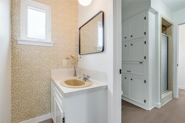 10133 Oliver Dr, Austin, TX 78737 - full bathroom with wallpapered walls, vanity, and a stall shower