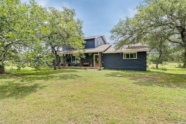 10133 Oliver Dr, Austin, TX 78737 - rear view of property with a yard