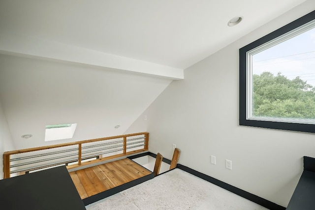 913 Christopher St, Austin, TX 78704 - bedroom with vaulted ceiling and baseboards