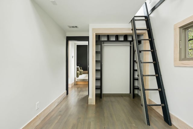 913 Christopher St, Austin, TX 78704 - unfurnished bedroom with wood finished floors and baseboards