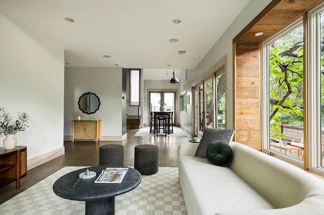 913 Christopher St, Austin, TX 78704 - living area with healthy amount of natural light, wood finished floors, and recessed lighting
