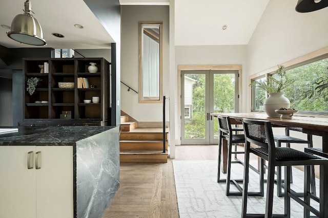 913 Christopher St, Austin, TX 78704 - dining area featuring stairway and light wood-style flooring
