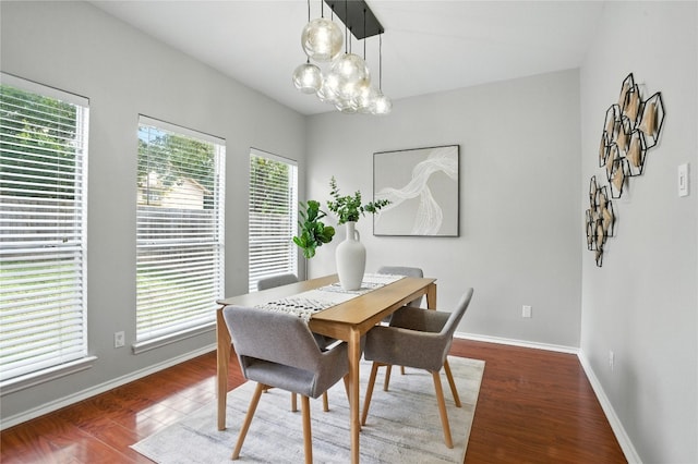 12007 Sky W Dr, Austin, TX 78758 - dining room with wood finished floors and a chandelier