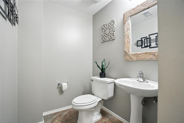 12007 Sky W Dr, Austin, TX 78758 - bathroom featuring stone tile floors