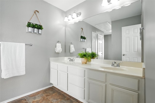 12007 Sky W Dr, Austin, TX 78758 - bathroom with double vanity and stone finish flooring